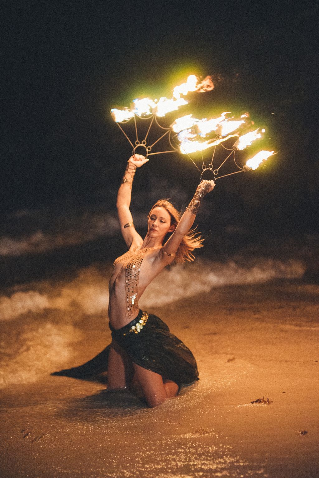 Fire fan dancer at South Florida event